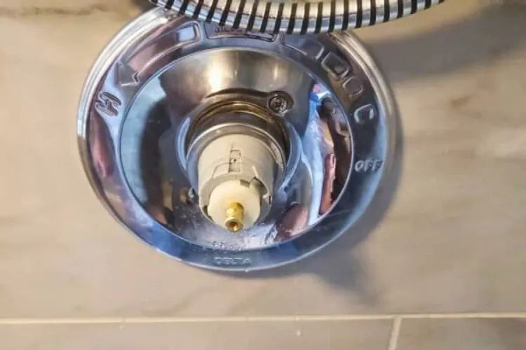 how to make shower water hotter delta