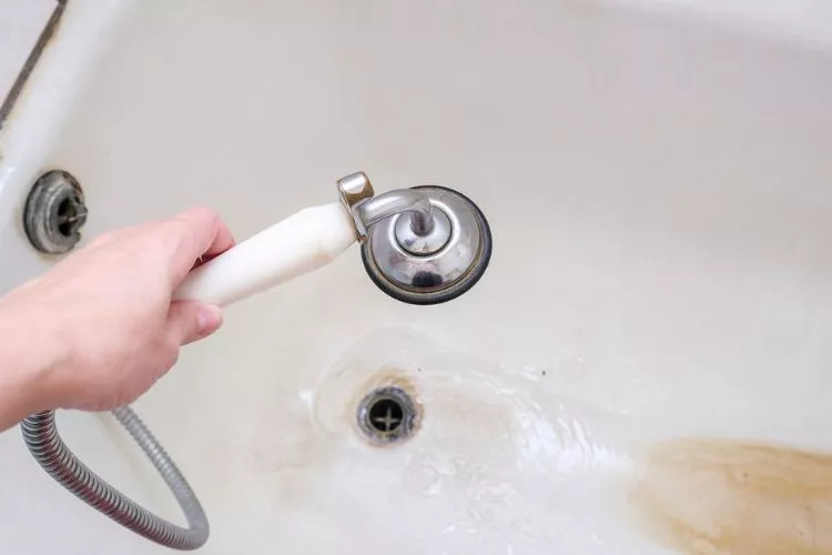 How to get sand out of bathtub drain